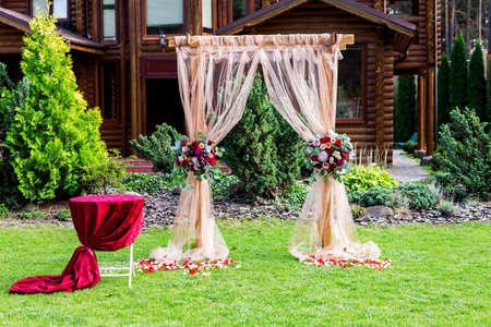 Beautiful setting for outdoors wedding ceremony waiting for bride and groom and guests.の写真素材