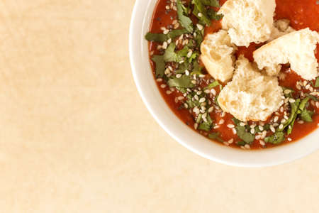 Italian pureed tomato soup gazpacho with croutons and fresh basil. Healthy food concept.の写真素材
