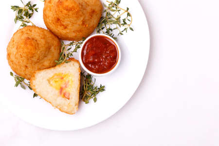 sicilian arancini di riso. fried risotto rice balls. italian  food. Coxinha of chicken, Brazilian...