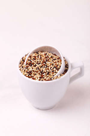 Mix red, black and white quinoa grains, superfood. Diet, Dieting concept. Vegan foodの写真素材