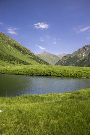 Lake of the Dzitaku in the mountains of the Caucasian range, Krasnaya Polyana, Sochi, Russiaのeditorial素材