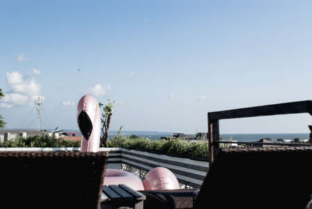 Pink flamingo  pool float in the rooftop swimming poolの写真素材