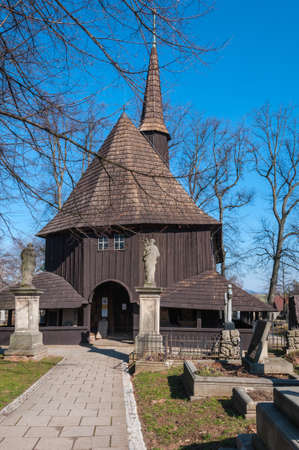 The oldest wooden church - Broumov, Czech Republic, Wooden church of the Virgin Mary and the cemeteryの写真素材