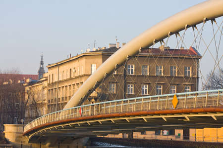 Bridge over Vistula river at sunset time, Krakow, Poland の写真素材
