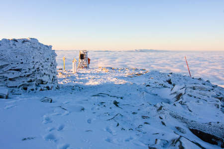 Landscape winter hill scene with fog  の写真素材