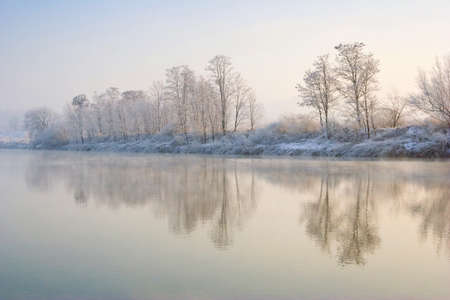 Winter sunrise over the river の写真素材
