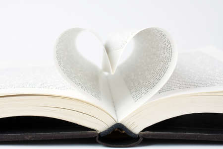 Book with pages folded into a heart shape の写真素材