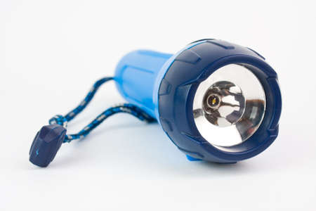 electric pocket flashlight isolated on white background の写真素材