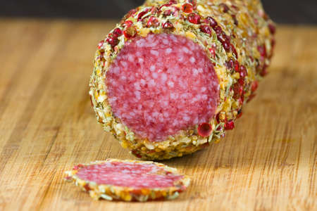 salami on wood tableの写真素材