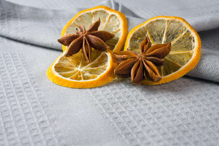 cinnamon sticks, anise stars and sliced of dried citrusの写真素材