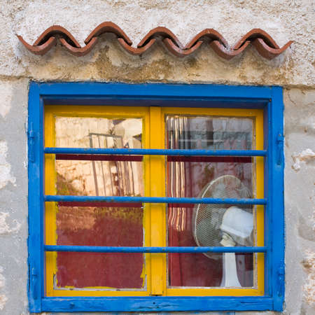 Yellow and blue window, Dalmatia, Croatiaの写真素材