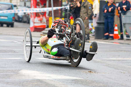  KRAKOW, POLAND - APRIL 28   Cracovia Marathon Handicapped man marathon runners in a wheelchair on...