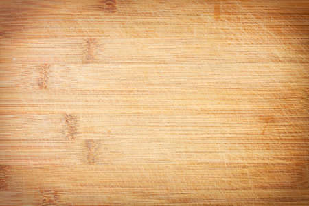 Old grunge wooden cutting kitchen desk board background textureの写真素材