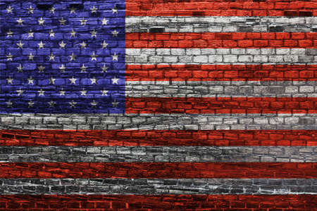 American flag on old brick wall Texture or background の写真素材