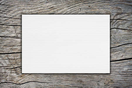 White paper on wooden board