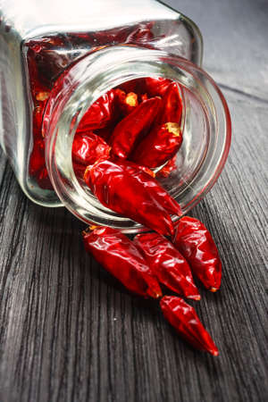 chili peppers on a tableの写真素材