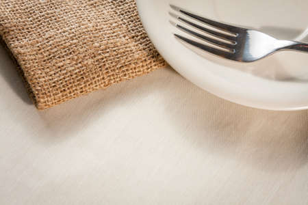 silverware on rustic wooden plate の写真素材