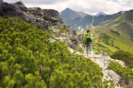 woman hiking in mountains 