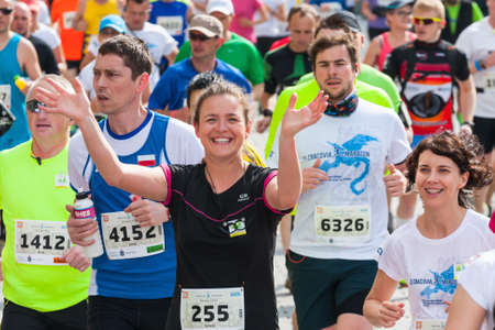 KRAKOW, POLAND - MAY 18 : Cracovia Marathon. Runners on the city streets on May 18, 2014 in Krakow,...