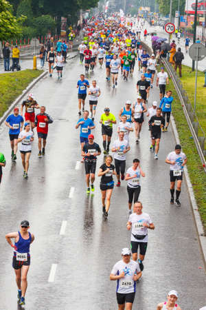 KRAKOW, POLAND - MAY 18 : Cracovia Marathon. Runners on the city streets on May 18, 2014 in Krakow, POLAND のeditorial素材