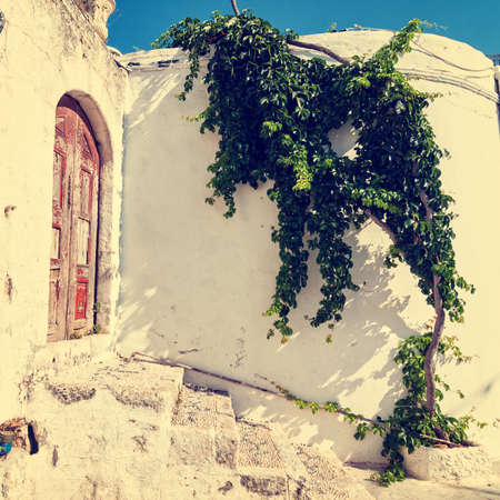vintage photo of narrow street in Lindos. Rhodes, Greece の写真素材