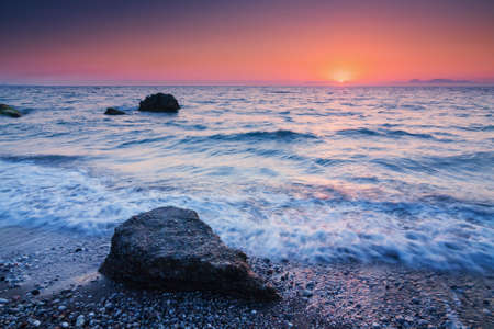 Colorful sunset over the seaの写真素材