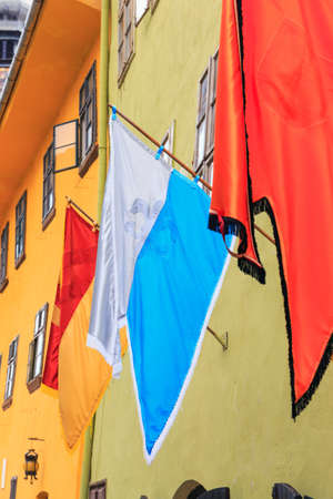 three flags on the wallの写真素材