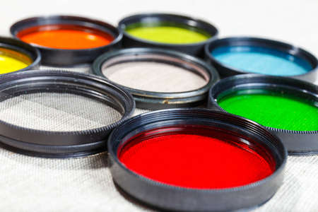 Color filters for lenses on bright backgroundの写真素材