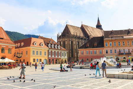 BRASOV, ROMANIA - JULY 15: Council Square on July 15, 2014 in Brasov, Romania. Brasov is known for...