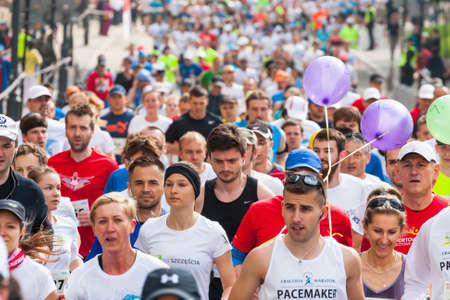 KRAKOW, POLAND - MAY 18 : Cracovia Marathon. Runners on the city streets on May 18, 2014 in Krakow, POLAND のeditorial素材
