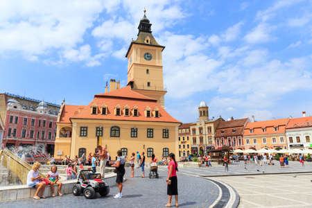 BRASOV, ROMANIA - JULY 15: Council Square on July 15, 2014 in Brasov, Romania. Brasov is known for its Old Town, which is a major tourist attraction includes the Black Church, Council Square and medieval buildings. のeditorial素材
