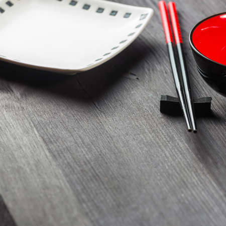 Two chopsticks on sushi mat backgroundの写真素材