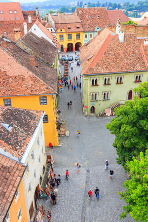 SIGHISOARA, ROMANIA - JULY 17: Aerial view of Old Town in Sighisoara, major tourist attraction on July 17, 2014. City in which was born Vlad Tepes, Draculaのeditorial素材