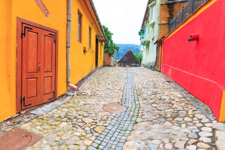 Medieval street view in Sighisoara founded by saxon colonists in XIII century, Romaniaの写真素材