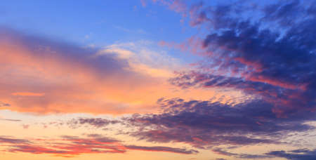 orange, blue  and yellow colors sunset sky の写真素材