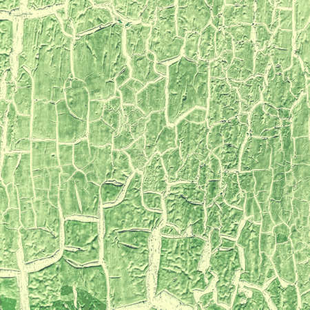 cracked paint on the concrete wall の写真素材