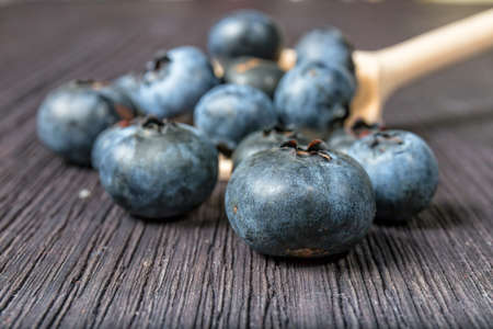 Blueberry on wooden boardの写真素材