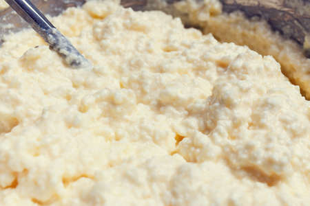Preparing dough. ingredients with milk, flour, curd, eggs, sugarの写真素材