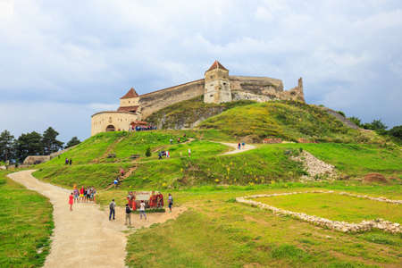 Rasnov, Romania - July 16, 2014: Tourists visit the medieval castle in Rasnov. Fortress was built between 1211 and 1225のeditorial素材