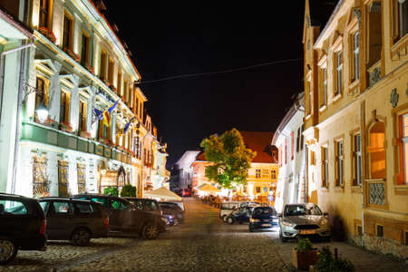 SIGHISOARA, ROMANIA - JULY 07: Night view of historic town Sighisoara on July 07, 2015. City in which was born Vlad Tepes, Draculaのeditorial素材