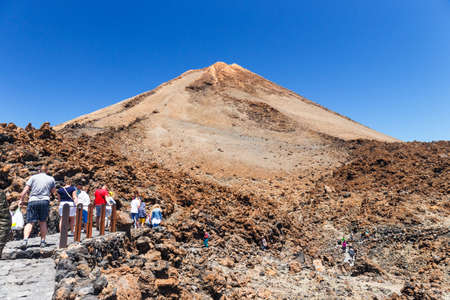 El Teide, Tenerife, June 06, 2015: Unidentified tourists are walking on the top of El Teide Volcano, Tenerife, Spainのeditorial素材
