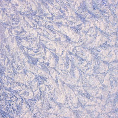 Frosted glass texture, abstract frosty pattern on glass