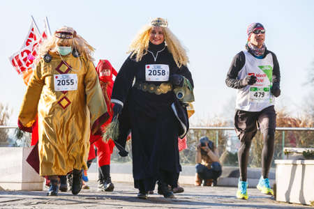 Krakow, Poland - December 31, 2015: 12th New Year's Eve Race in Krakow. The people running dressed...