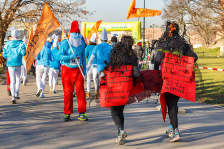Krakow, Poland - December 31, 2015: 12th New Year's Eve Race in Krakow. The people running dressed in funny costumesのeditorial素材