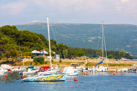 Krk, Croatia, 05 JULY 2010: View on sailboat harbor in Krk with many moored sail boats and yachts, Croatiaのeditorial素材