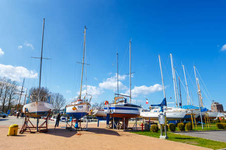 Kolobrzeg, Poland - April 08, 2016: View on harbor in Kolobrzeg with many moored boats and ships. Kolobrzeg is a popular tourist destinationのeditorial素材