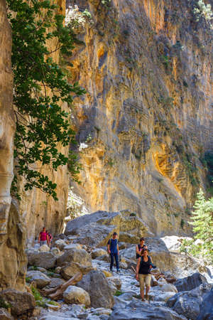 Samaria Gorge, Grece - MAY 26, 2016: Tourists hike in Samaria Gorge in central Crete, Greece. The national park is a UNESCO Biosphere Reserve since 1981のeditorial素材