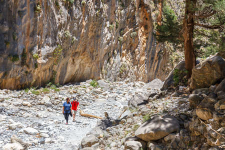 Samaria Gorge, Grece - MAY 26, 2016: Tourists hike in Samaria Gorge in central Crete, Greece. The national park is a UNESCO Biosphere Reserve since 1981のeditorial素材