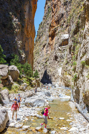 Samaria Gorge, Grece - MAY 26, 2016: Tourists hike in Samaria Gorge in central Crete, Greece. The national park is a UNESCO Biosphere Reserve since 1981のeditorial素材