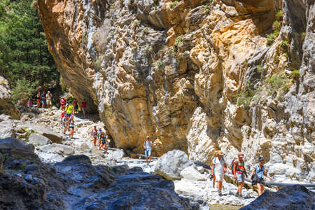 Samaria Gorge, Grece - MAY 26, 2016: Tourists hike in Samaria Gorge in central Crete, Greece. The national park is a UNESCO Biosphere Reserve since 1981のeditorial素材